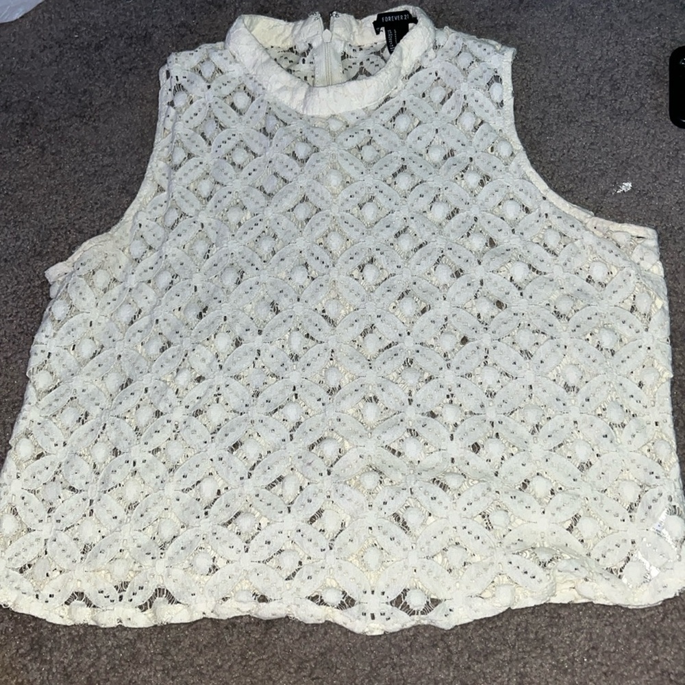 cream colored see through lace top tight neck with zipper down back